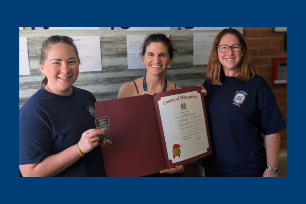 Head of School receiving proclamation from Montgomery County .