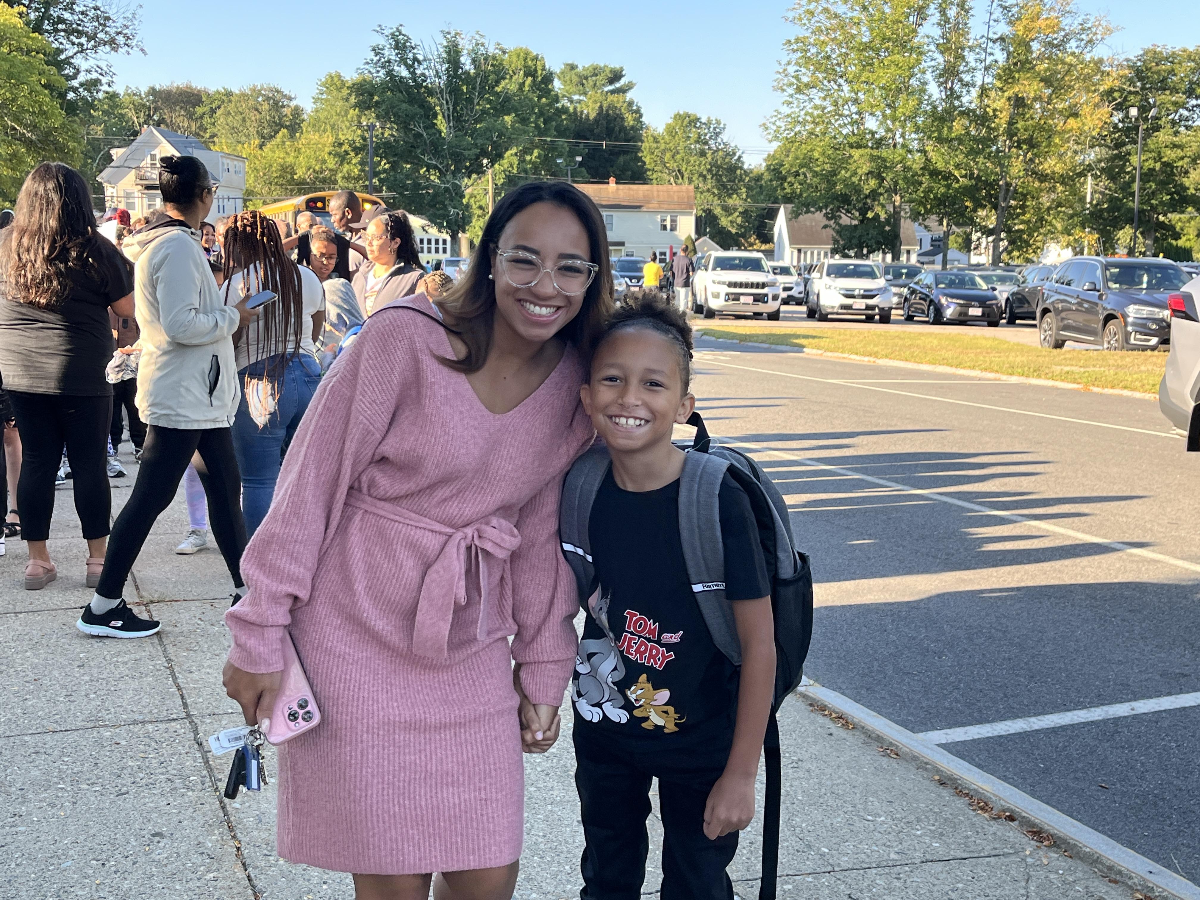 Woman and child on the first day of school 2024.