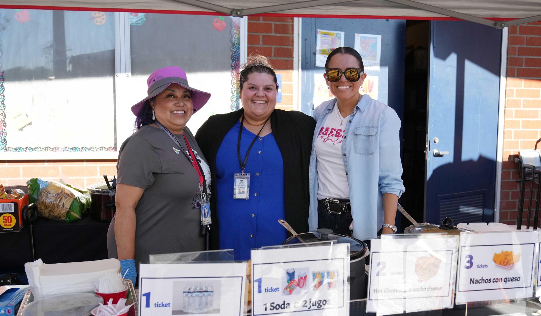 Three teachers at Hyatt's Harvest Festival