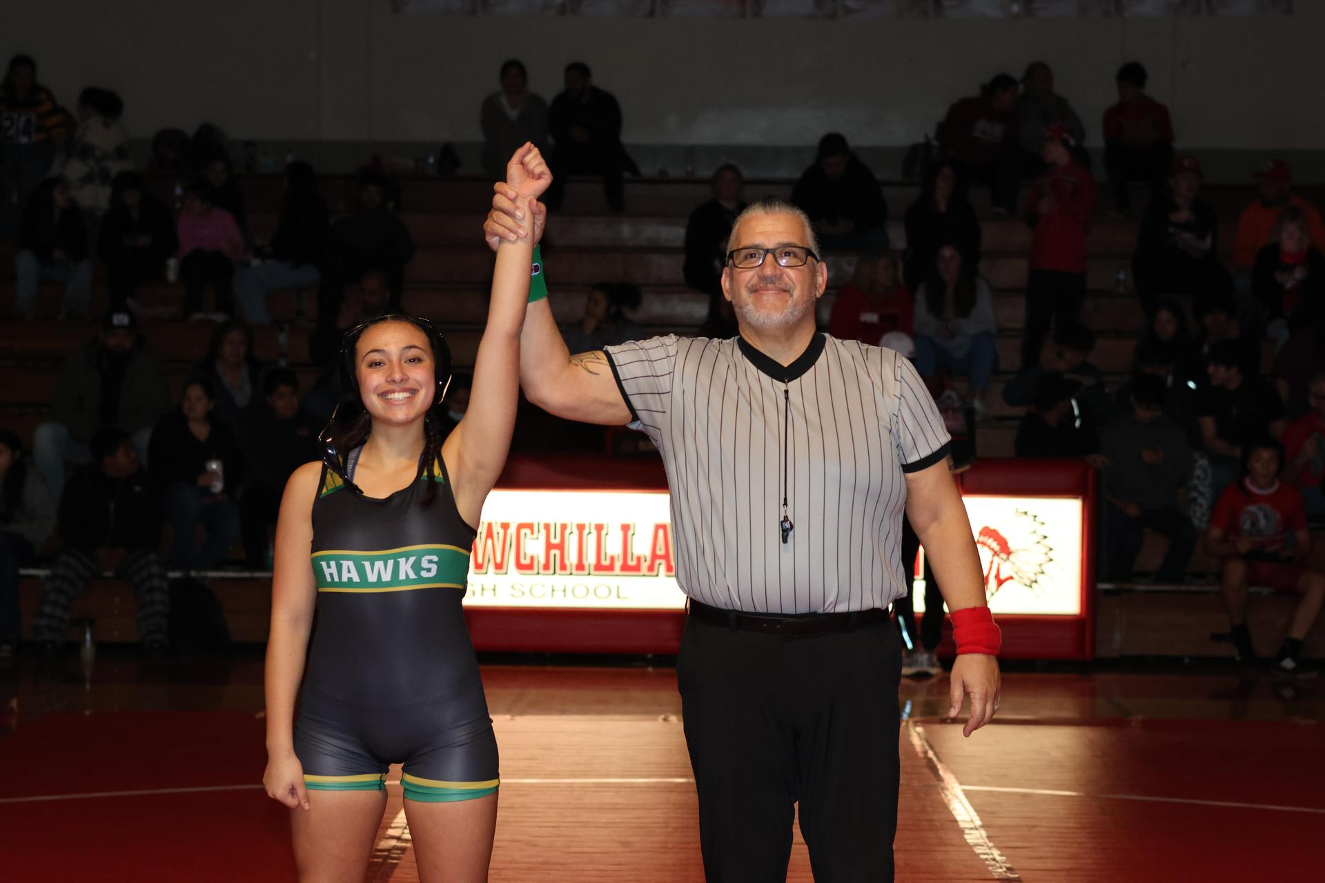Wrestling winners with hands up 51