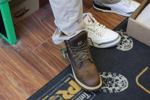Student trying on shoes