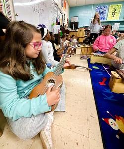 Student playing instrument