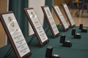 Plaques and celebratory rings are displayed at the 2021 Prince George Hall of Fame ceremony in 2021