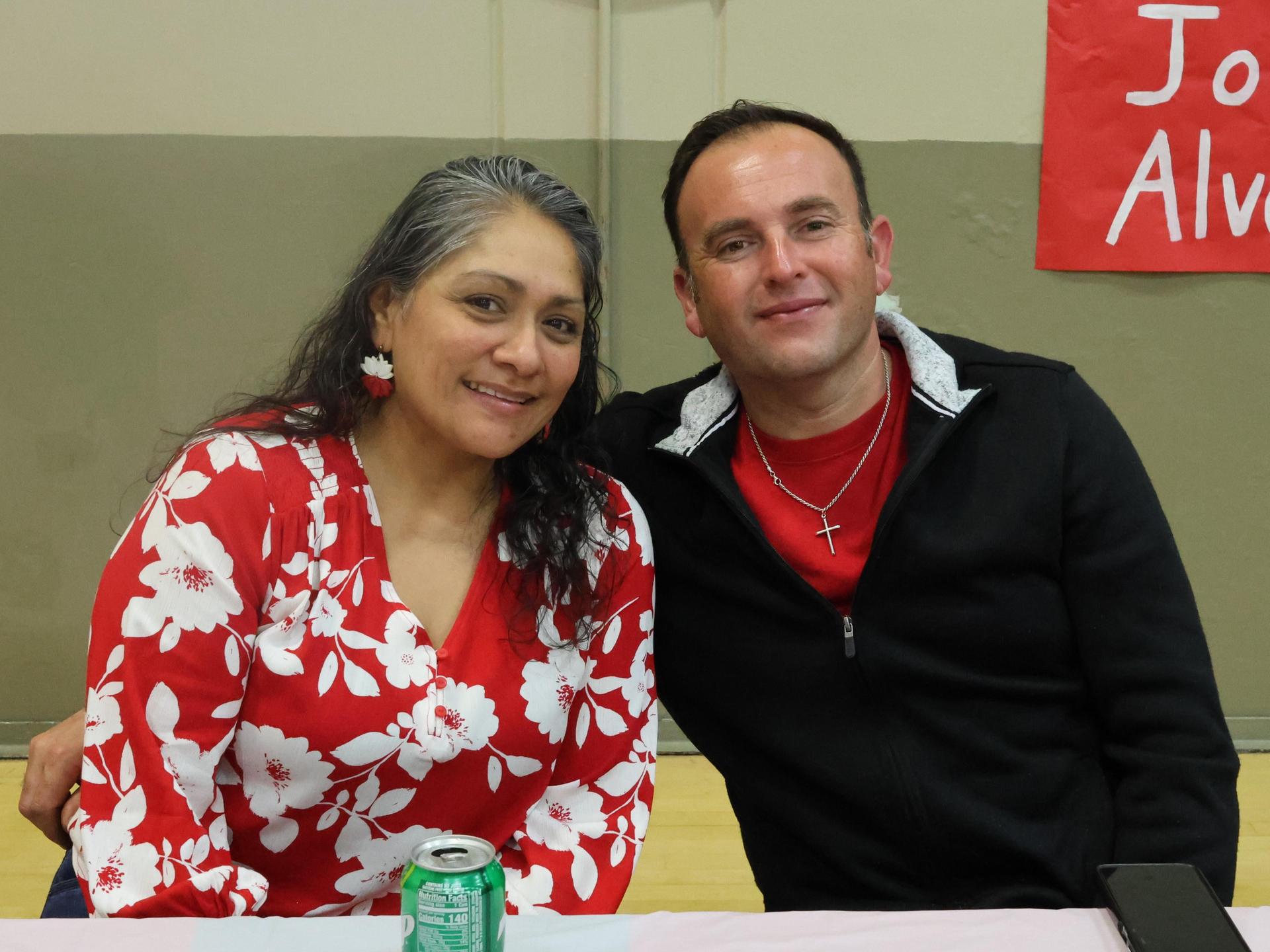 two parents posing