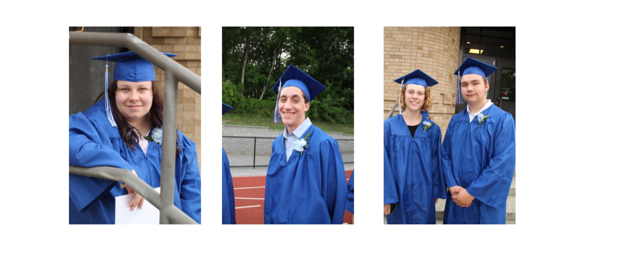 students in cap and gown smiling