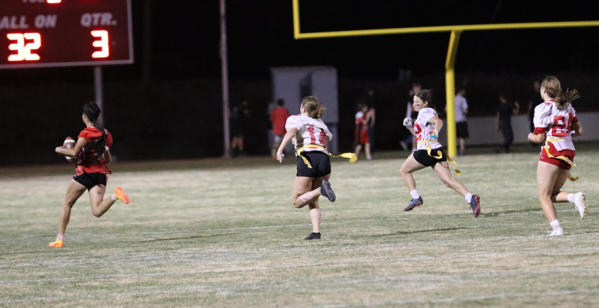 girls playing flag football