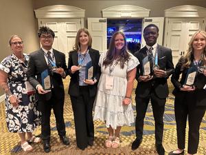 FHS presentation team with their national champion trophy