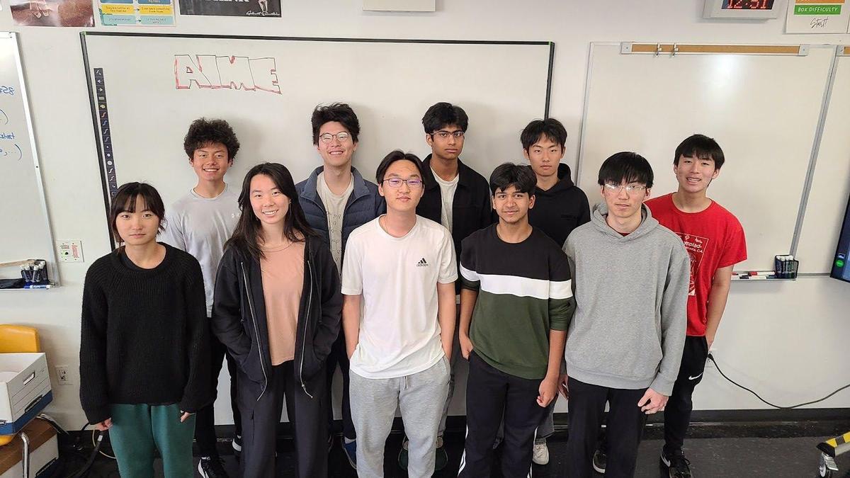 Arcadia High School’s 12 (two not pictured) 2024 American Invitational Mathematics Exam Qualifiers. Huang is located in the back row, second from left.