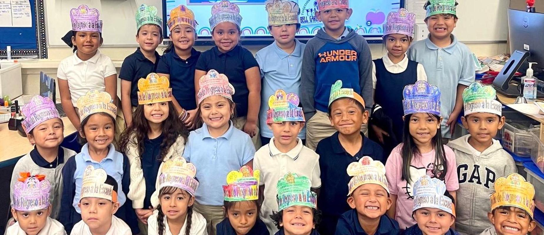 Picture of students in their class smiling