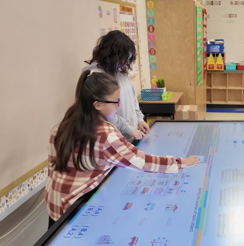 Truman Students Using a Large Touchscreen
