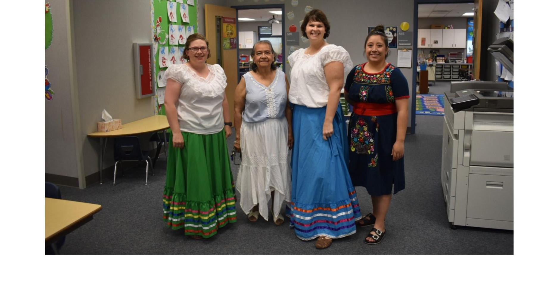 Four of our kindergarten teachers dressed up for cultural dress day.