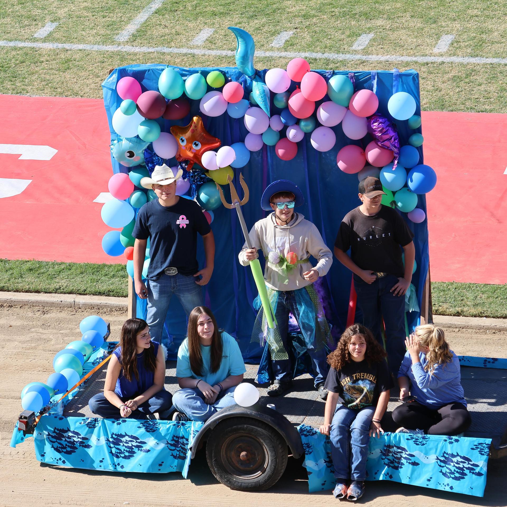 students and staff at the homecoming rally