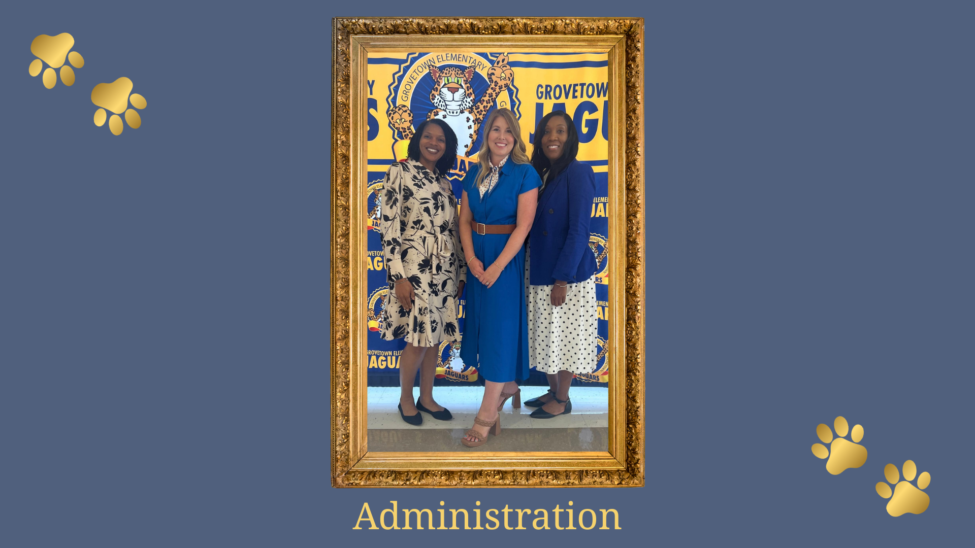 Three women posed together in front of a school backdrop, labeled 'Administration'.