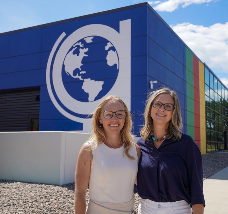 Co-Founders in front of our forever home