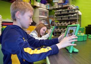 Students using an iPad