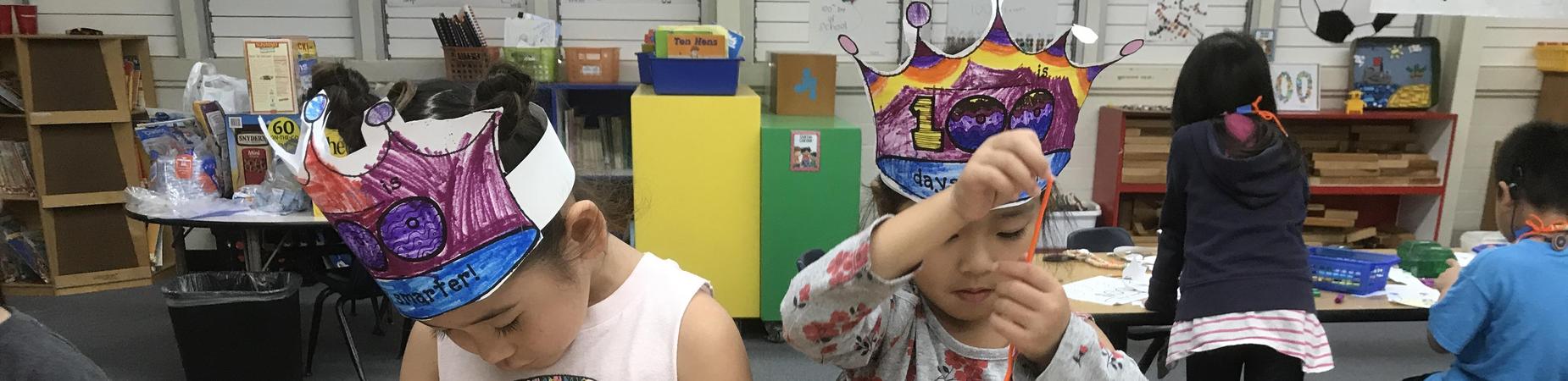 2 students working on 100 day