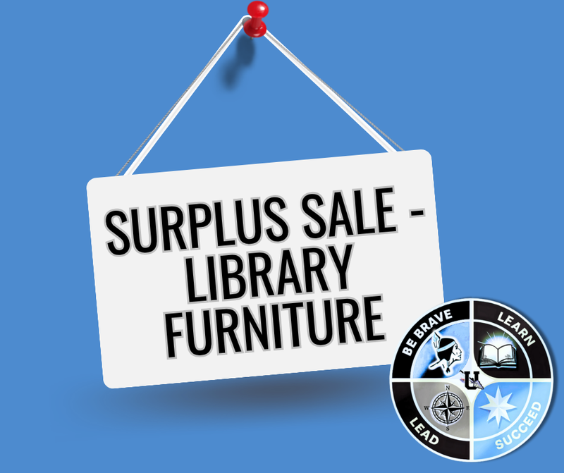 Sign showing Surplus Sale for Library Furniture
