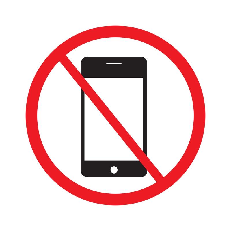 No Phones, Headphones, or non-school issued smart devices in school