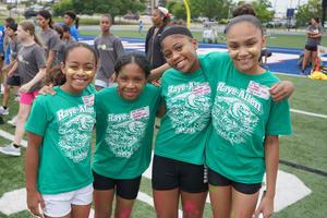Students from Raye-Allen Elementary relax between events