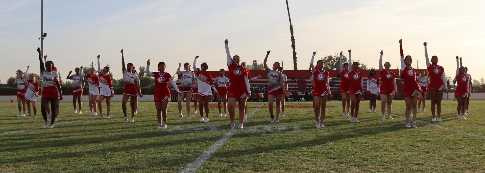 Cheerleaders performing at the football game