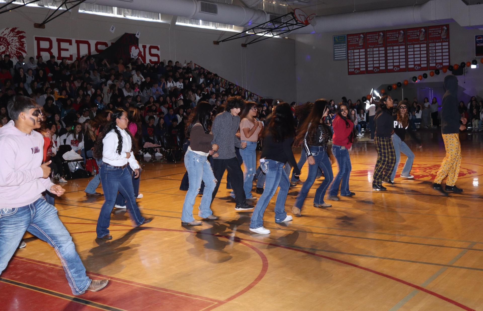 Students and staff enjoying the fall sports rally