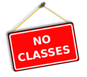 red hanging sign that says no classes in white letters