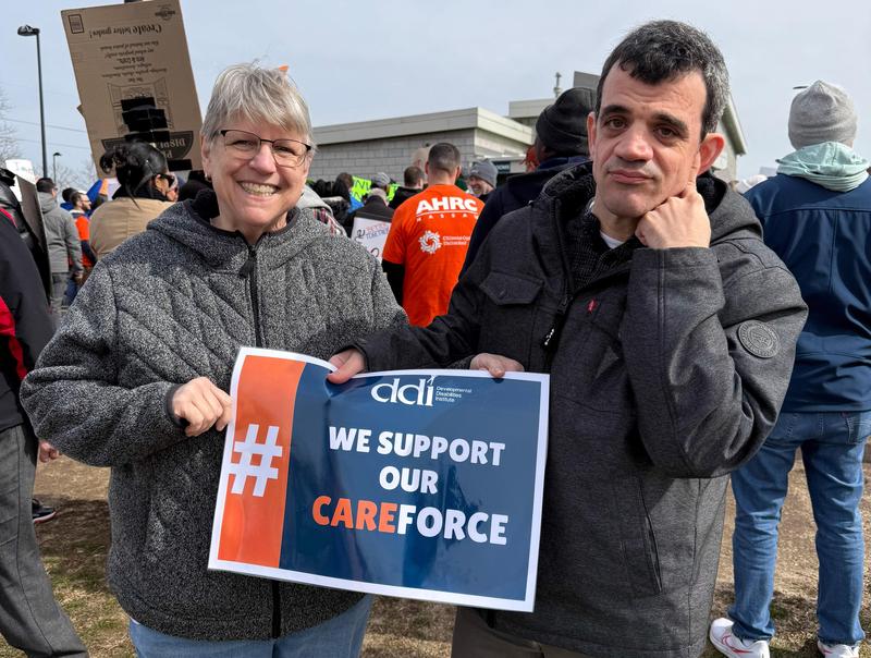 Staff and self-advocate at LI rally