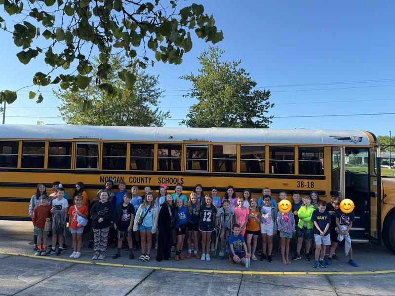 Students in Front of School Bus