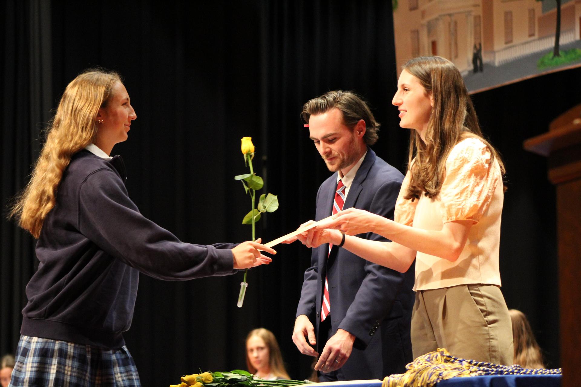 A student receives an award 