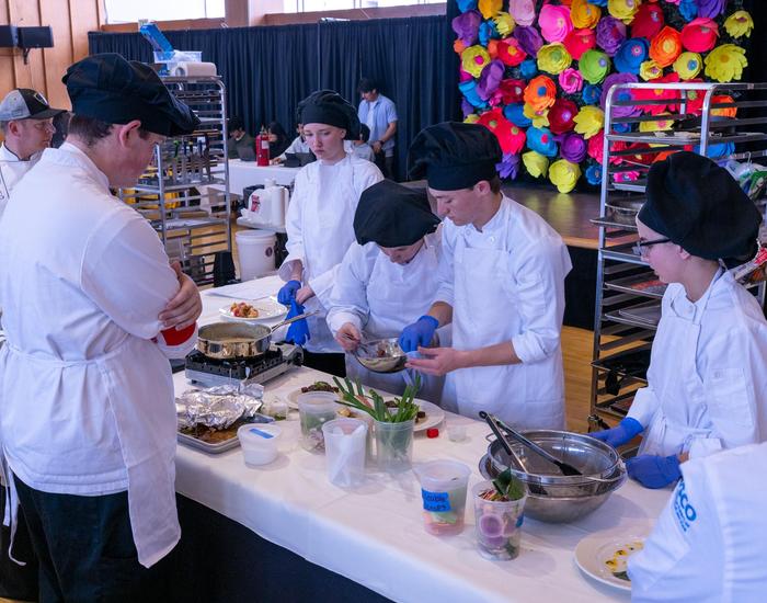Students participating in cooking competition