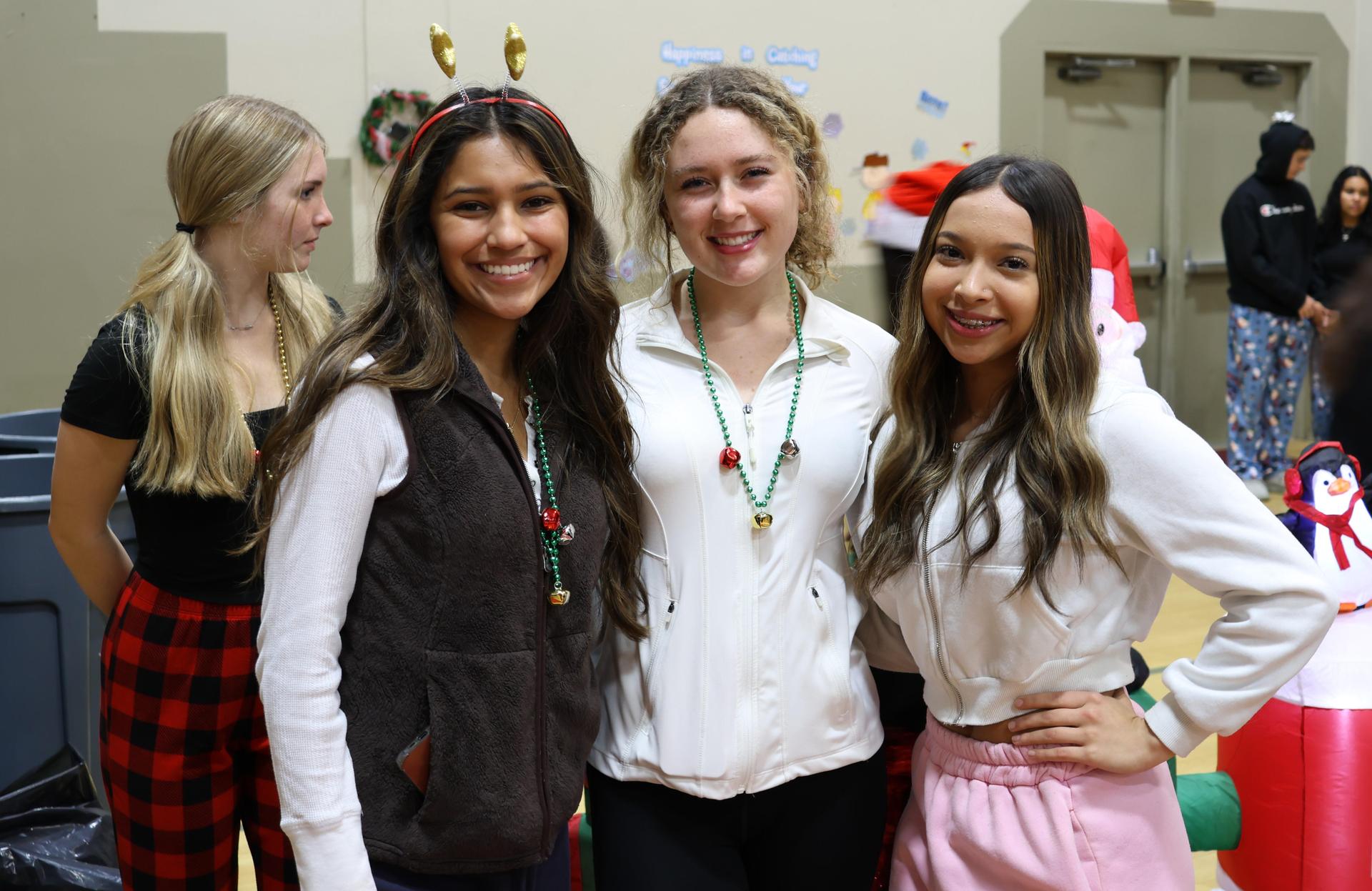 students and staff posing at the winter wishes rally