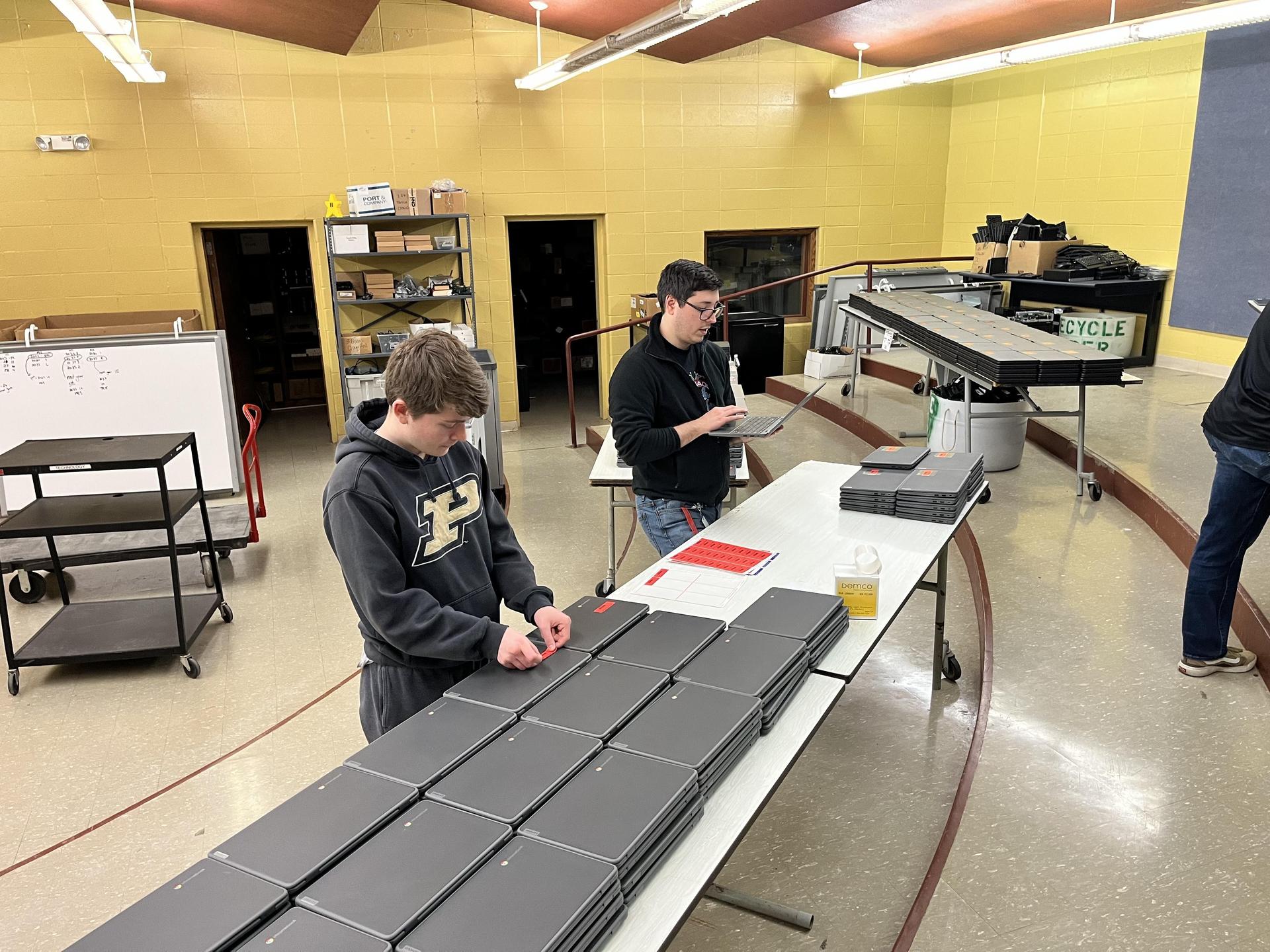 Tech Tribe students working or learning