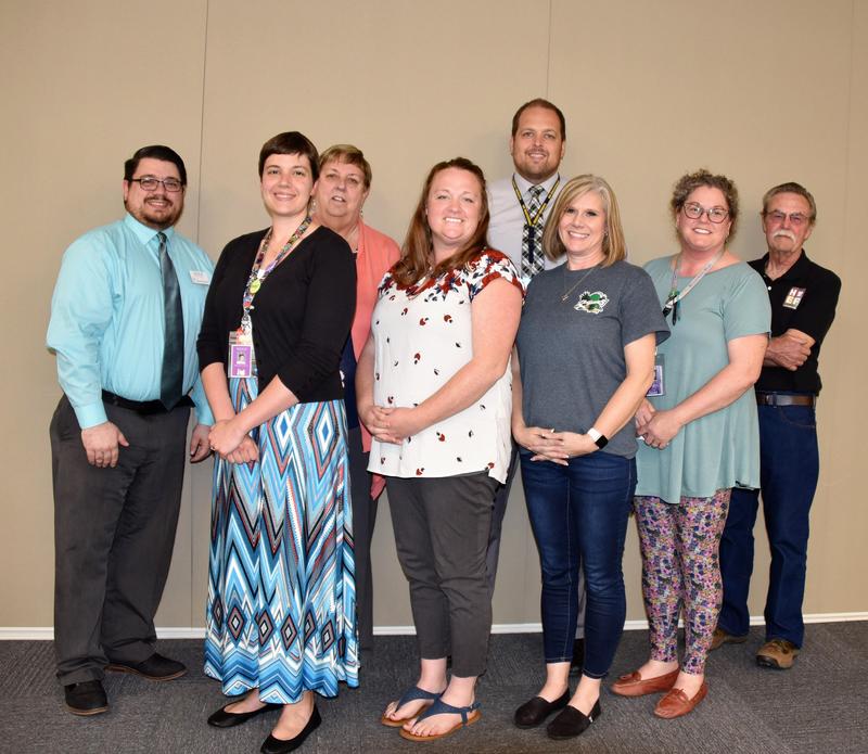 Back row: HSD Board Vice-Chair and HEF Member Josh Goller, HSD Board Chair and HEF Member Karen Sherman, HEF Member and Rocky Heights Principal Jerad Farley, and HEF Chair Dr. George Clough.  Front row: Rebecca Crawford, Shareana Sparks, Tammy Mayer, and Delia Fields, not pictured High School Agriculture Instructor Brianna Smith