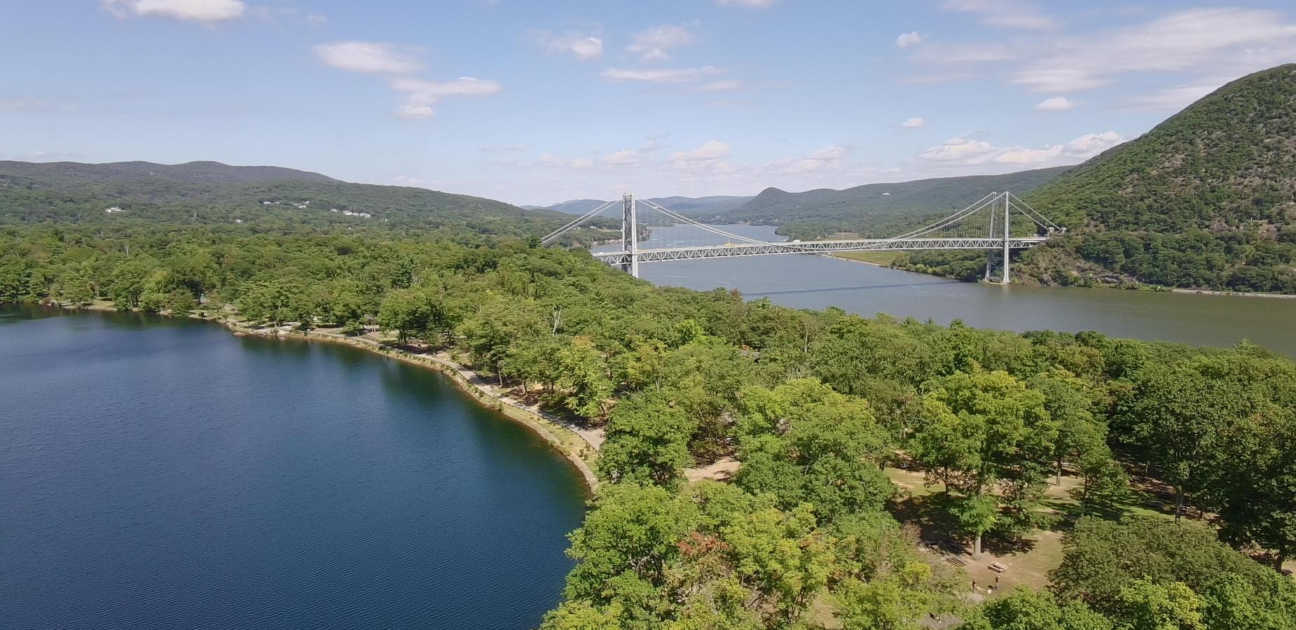 View of lake and bridge in Bear Mountain