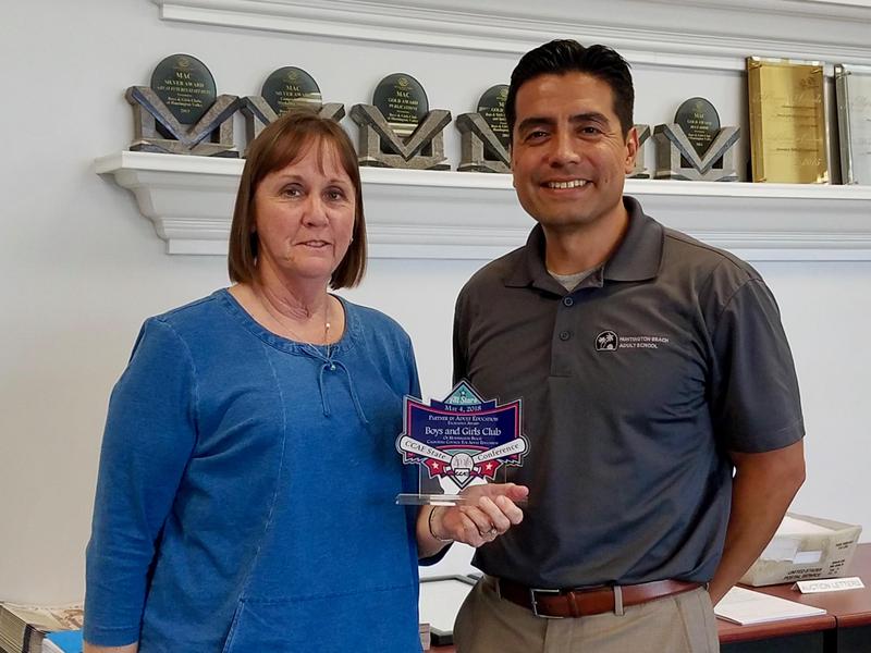 Principal Curiel presents award to Boys and Girls Clubs of Huntington Valley