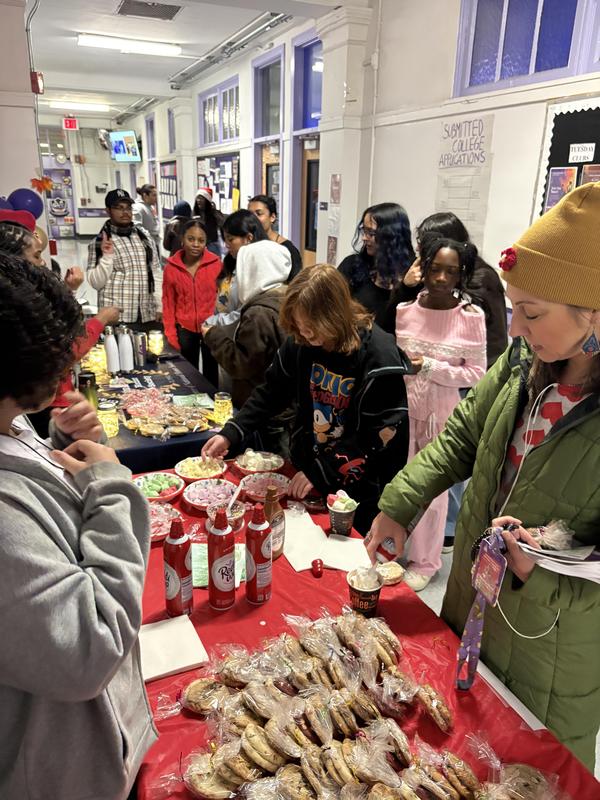Picture of students gathering for food.