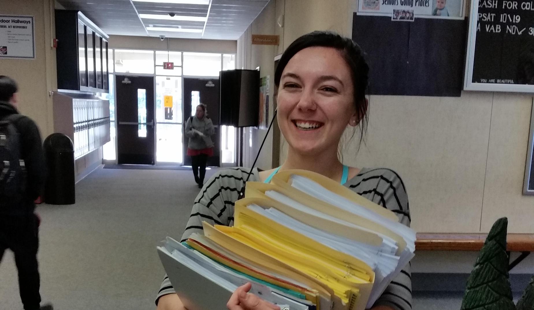 Female student carrying books