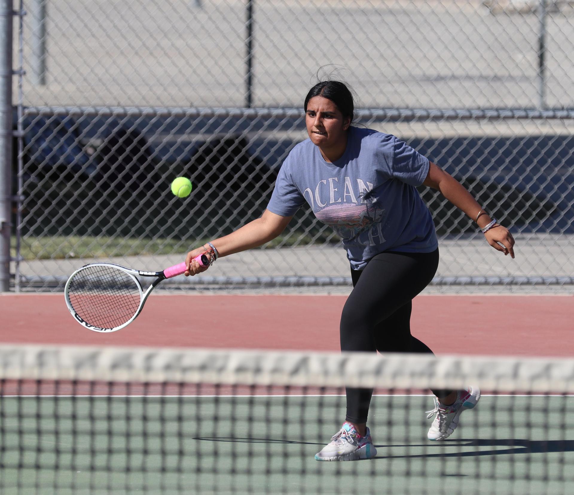 girls playing tennis against Golden Valley