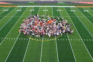 staff on new turf field