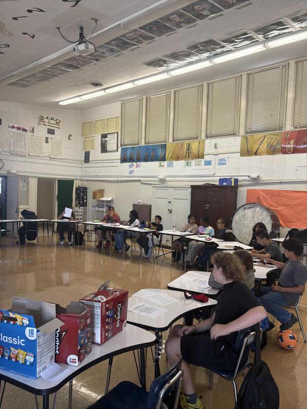 ListenUp students at desks in the music room