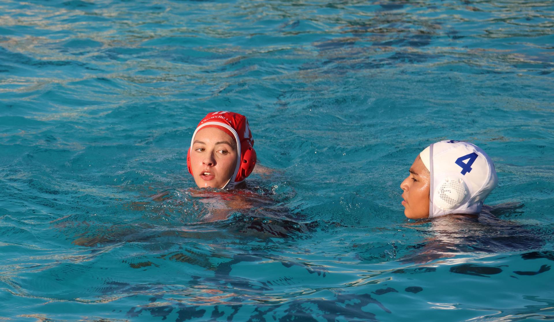 girls playing water polo against Sanger West