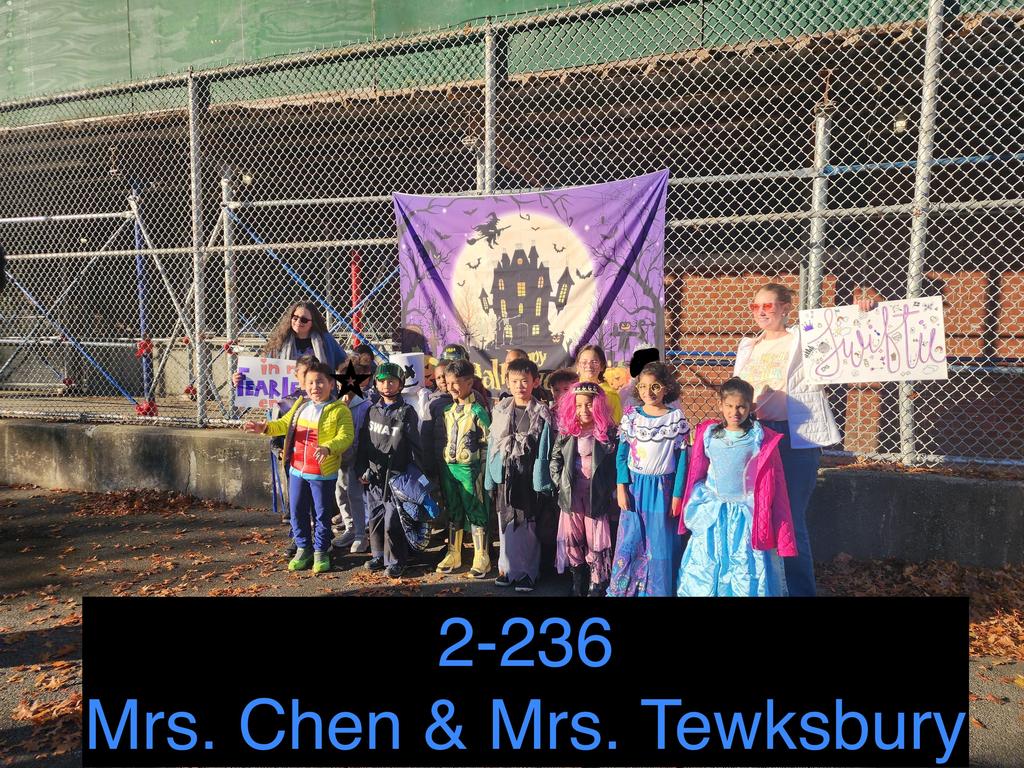 staff and students in halloween costumes