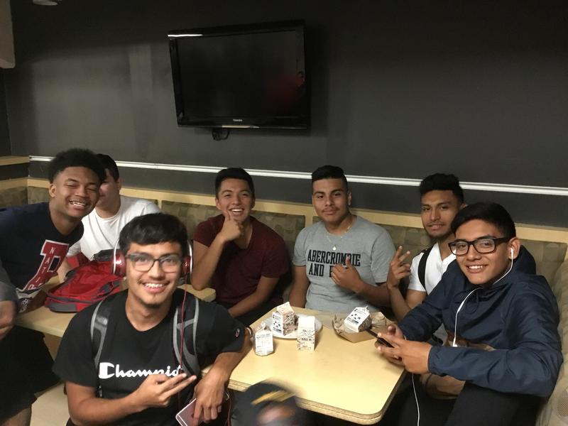 Guys hanging out at Godwin