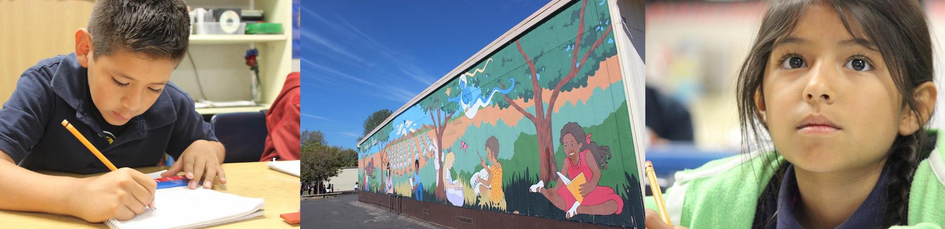 two students and a mural on the side of the building