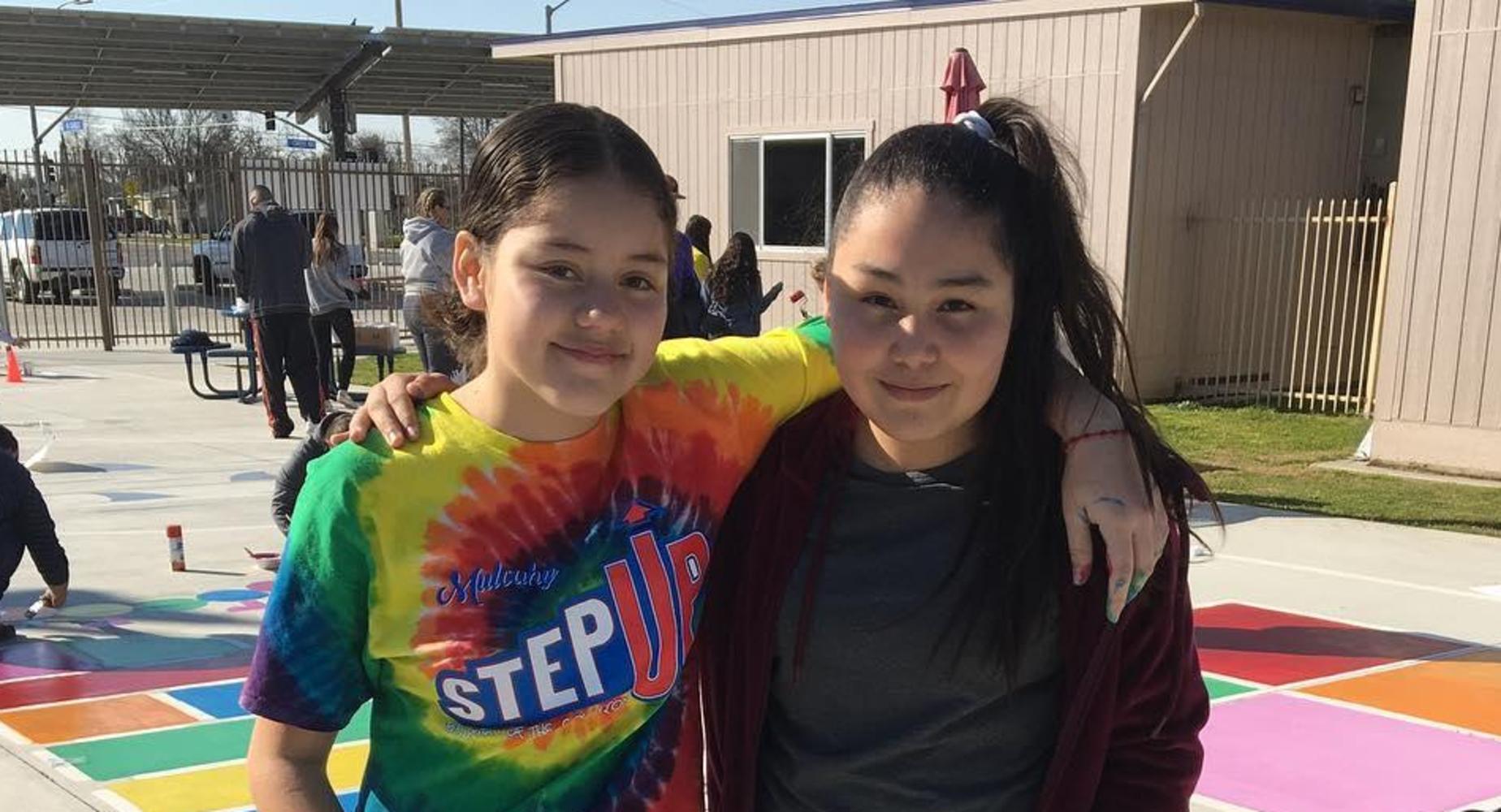 Students hugging at Mulcahy Step-up
