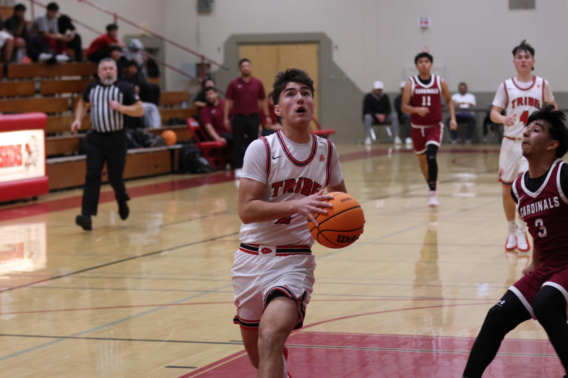 Varsity Boys Basketball playing vs. Orosi 62