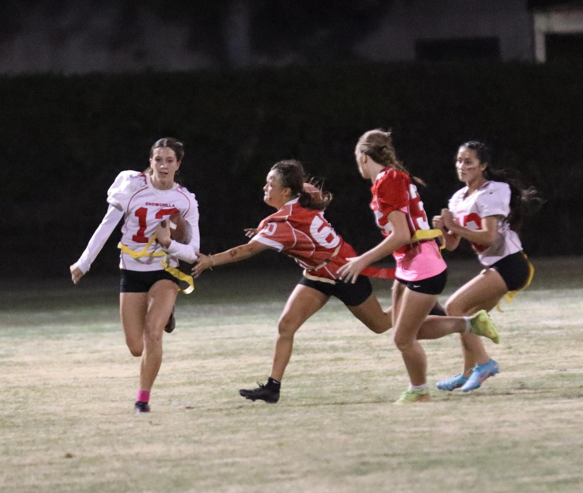 girls playing flag football