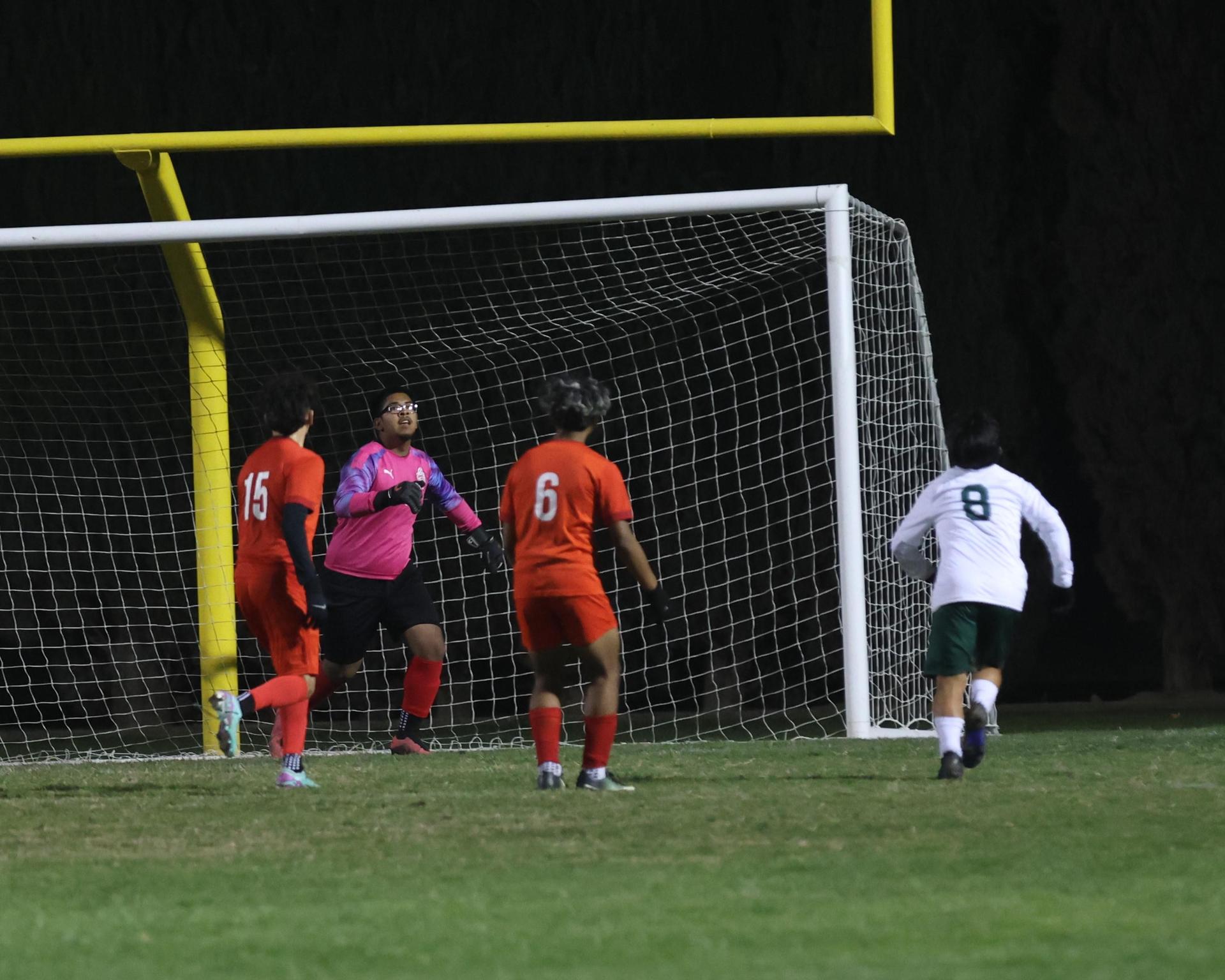 Varsity boys play soccer against Kingsburg