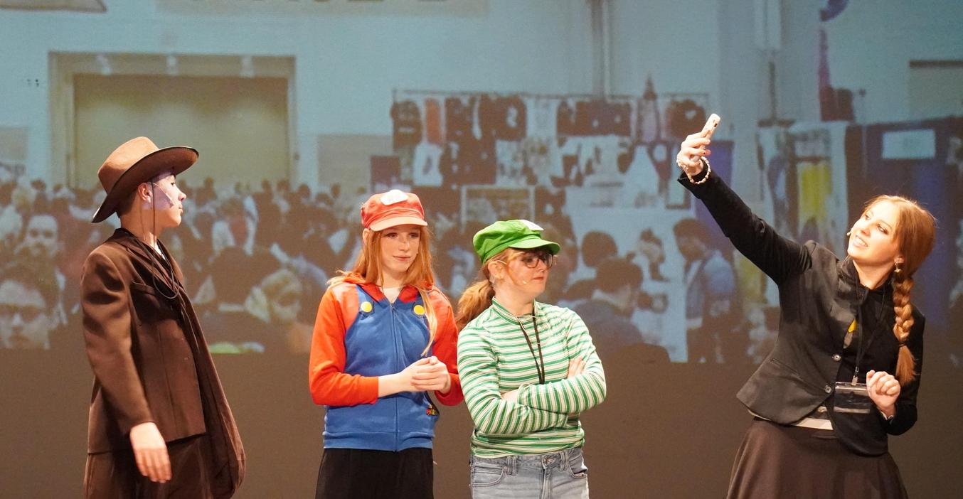Students perform a scene in the spring play "The Con."