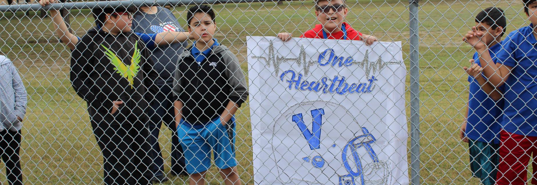 students with signs